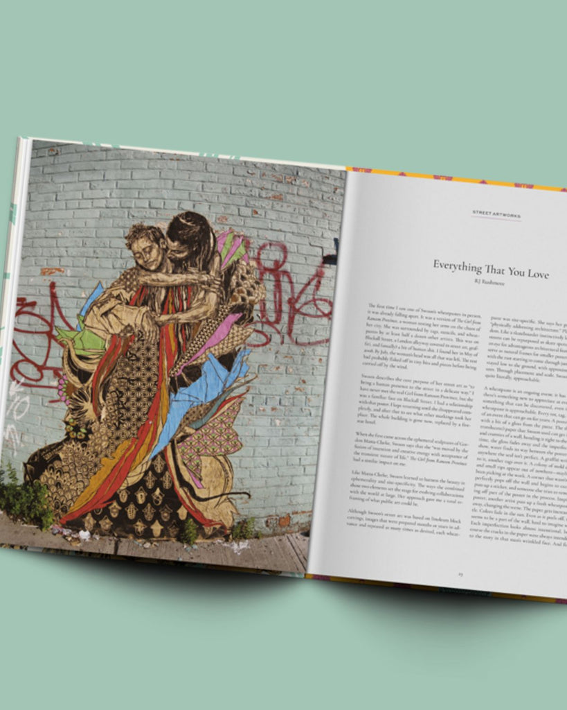 A view of the book open with graffiti art on the left and text on the right.
